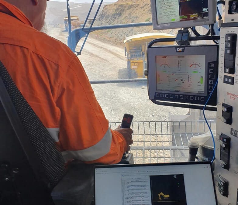 Mining operator using automation and control systems inside heavy equipment